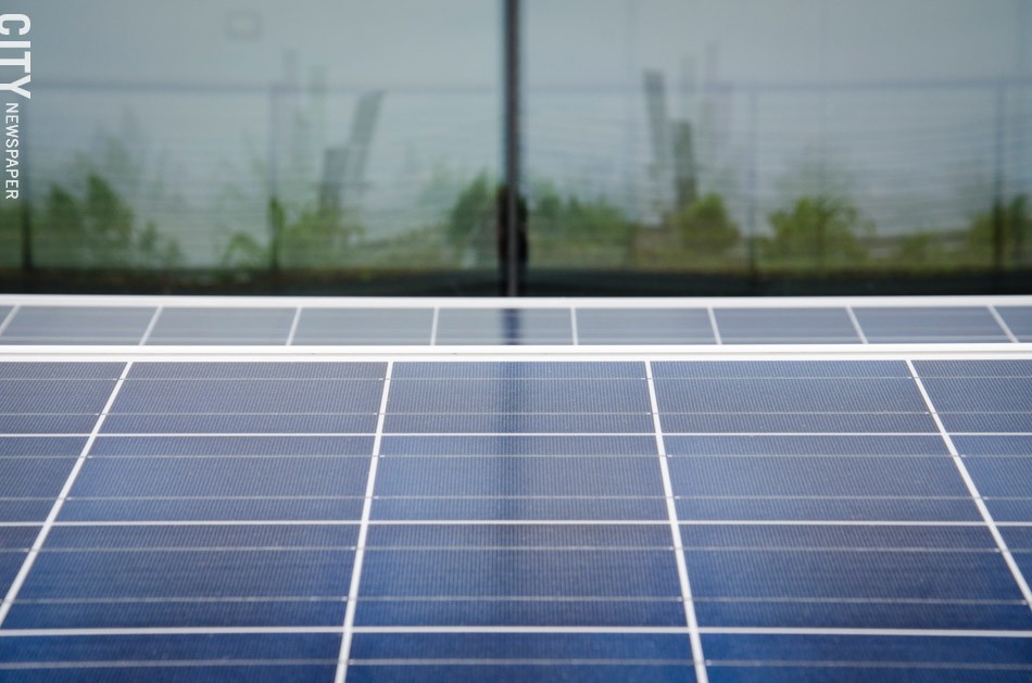 RIT's Golisano Institute for Sustainability has a 400 kilowatt solar array on its roof. - PHOTO BY MARK CHAMBERLIN