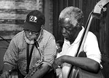 DON VERPLOEG/VP COMMUNICATIONS - Saxophonist Carl Atkins and bassist Keter - Betts work on recording "It Don't Mean a Thing..." This year's Swing 'n Jazz Fest is dedicated to Betts, who died last August.
