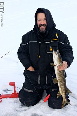 Tim Thomas with his catch. - PHOTO BY KATHY LALUK