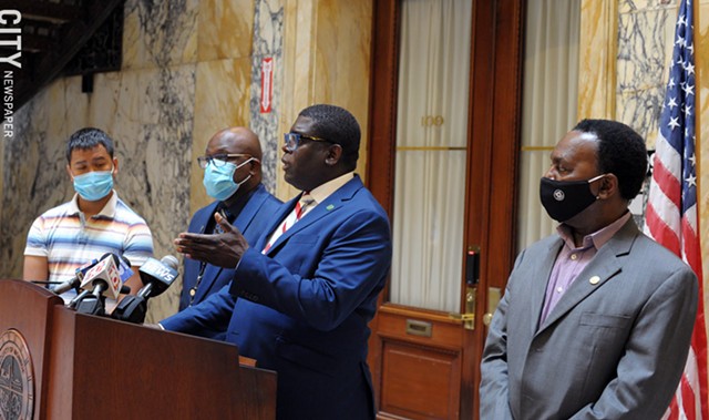 Vince Felder, Democratic minority leader of the County Legislature, defends elections commissioners LaShana Boose and Lisa Nicolay during a news conference Friday. standing with him are, from left, county legislators Calvin Lee, Ernest Flagler-Mitchell, and Frank Keophetlasy. - PHOTO BY JEREMY MOULE