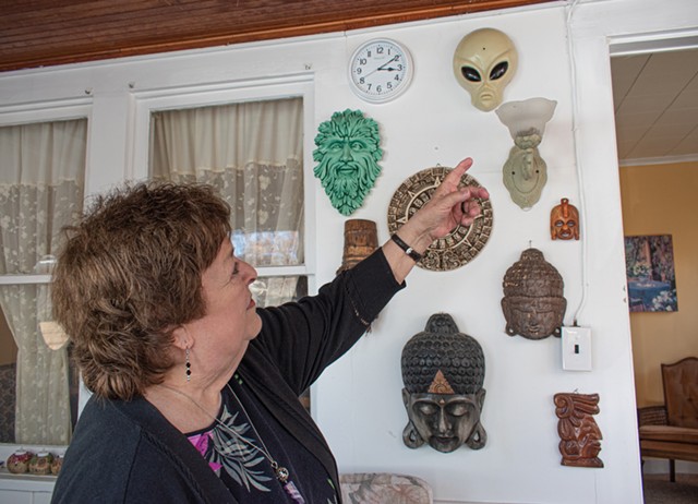 Stringfellow owns an impressive collection of extraterrestrial paraphernalia. - PHOTO BY JACOB WALSH