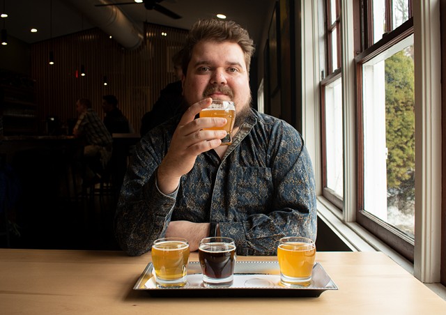 CITY beer columnist Gino Fanelli drinking a flight at Copper Leaf Brewing in Pittsford. - PHOTO BY JACOB WALSH