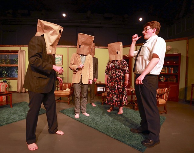 G. Tristan Berlet, right, plays the title role in the comedy "The Nerd." In this scene, he has convinced the other characters to play a bizarre party game. - PHOTO BY ANNETTE DRAGON