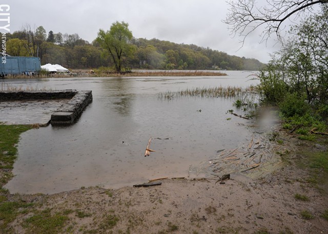 Water creeps up a boat launch at LaSalle's Landing in Penfield. - PHOTO BY JEREMY MOULE