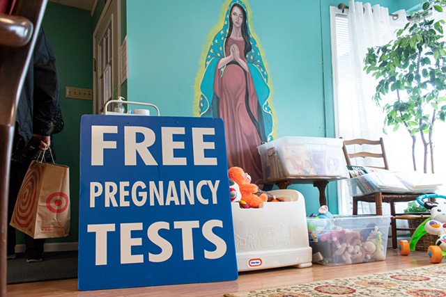 The interior of Focus Pregnancy Help Center features an abundance of religious paraphernalia.