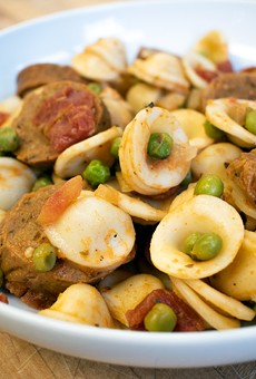 Conchiglie alla Burino, made with vegan butter, Grass Fed's Italian "sausage," tomatoes, white wine, garlic, onions, and peas.