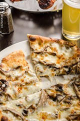 PHOTO BY MARK CHAMBERLIN - The funghi wood-fired pizza.